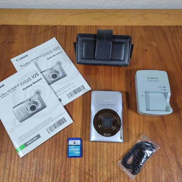 Canon PowerShot SD1300 IS Digital ELPH 12.1MP Camera Silver w/ Case Charger 2GB - Picture 1 of 12